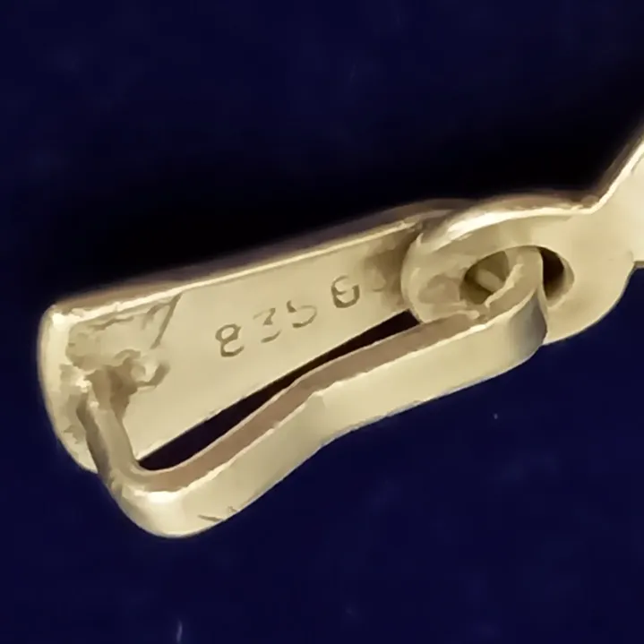 Colgante de plata tallada 835