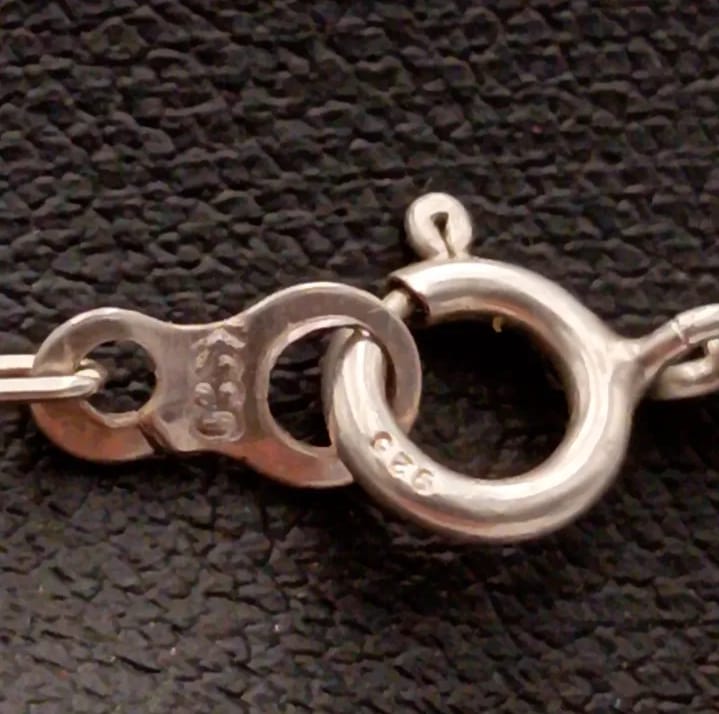 Colgante y prendedor de plata 980 y 925